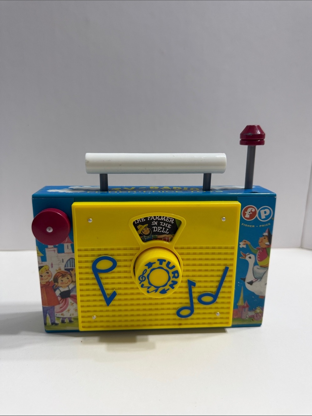 Fisher-Price Vintage Farmer in the Dell Turn-Box Toy Radio